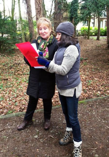 Historic maps of Carfin Estate are consulted during a site visit