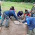 Opening the tile kiln and revealing the treasures inside